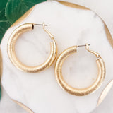 Gold Dipped Textured Round Hoop Earrings